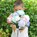 Child-Boy-Holding-Flowers