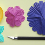 DIY-Colored-Flower-Lights-out-of-Cupcake-Liners-5