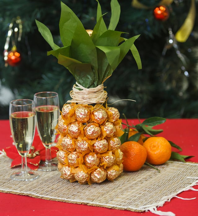 Creative Gift Wrap a Champagne Bottle Like a Pineapple with Chocolate