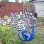 make-a-peacock-with-old-CDs-and-tire