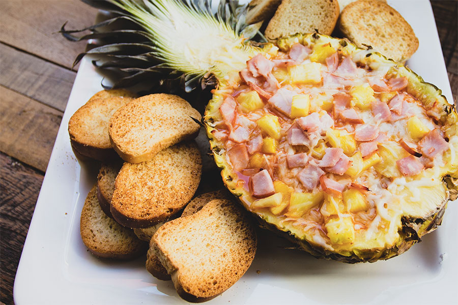 How to Make Hawaiian Pizza Dip Using a Pineapple Bowl