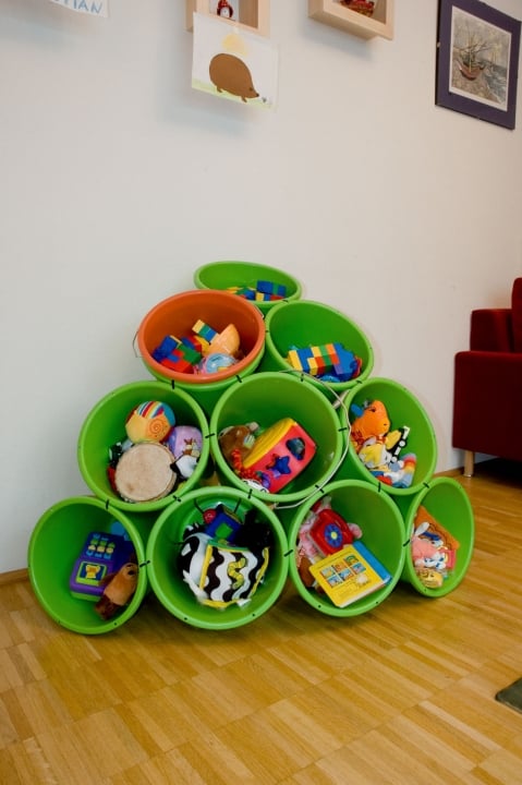 DIY Toy Storage. Just drill small holes into the buckets and connect with zip ties, so smart