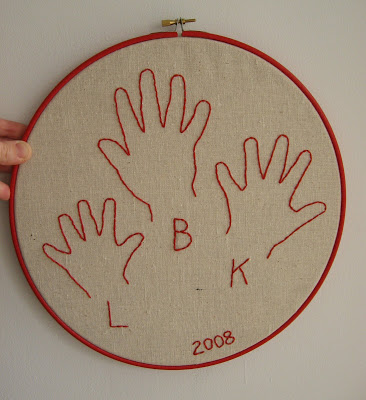 Embroidered family hand prints