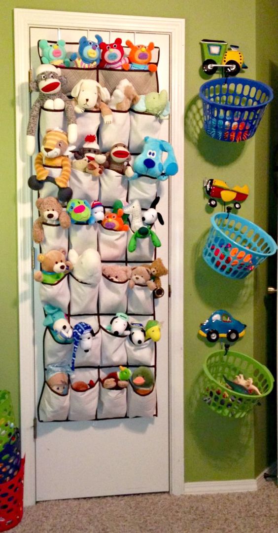 Use a Shoe Organizer to store stuffed animals and hang baskets for toys