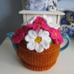 Knitting pot of colour  tea cosy