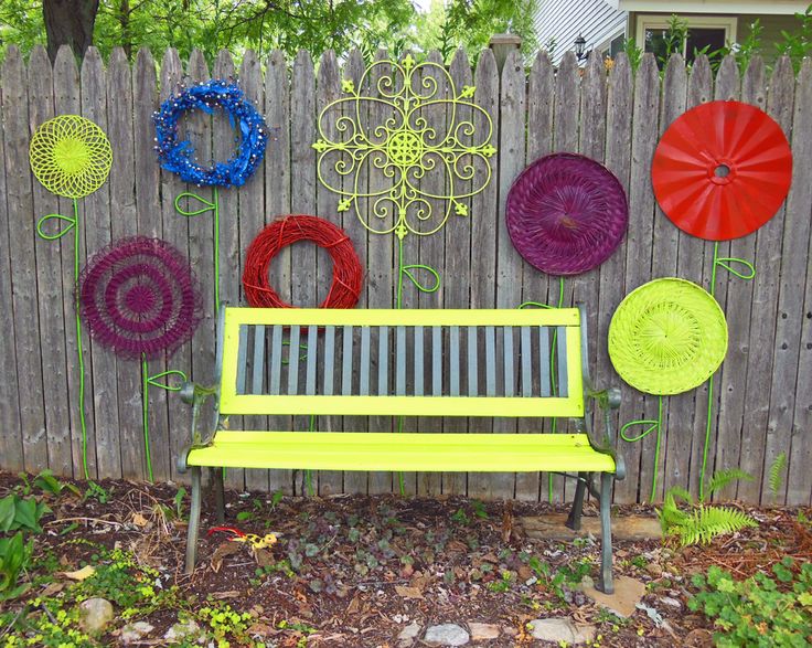 Cool DIY Ideas To Decorate Your Garden Fence 1