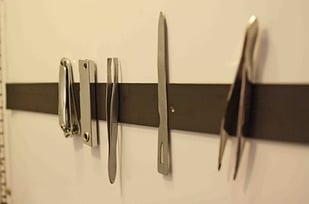 Add a magnetic strip in your bathroom cabinet to support bobby pins and tweezers