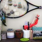 A tennis or badminton racket is a creative way to hang your jewelry