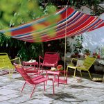 Colorful Chairs Under a DIY Canopy