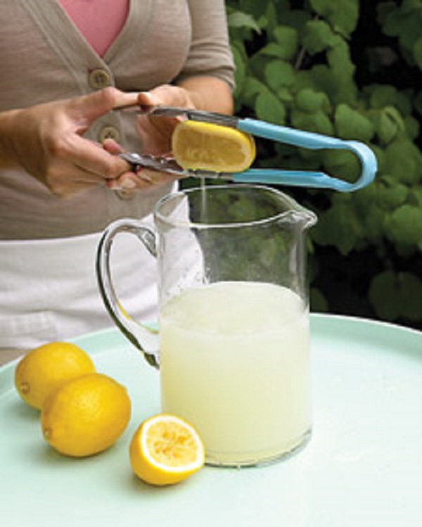 Strong tongs and a sieve give you perfectly squeezed lemons with no fuss